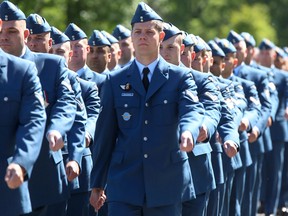 Tim Miller/The Intelligencer
Members of 436 Transport Squadron march through Bain Park on Friday in Quinte West. The squadron recently added the Afghanistan Battle Honour to its colours.