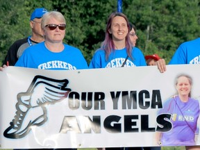 Jackie Duhaime, Monique Hutchinson and Kayla Kanmacher, members of the North Bay YMCA Trekkers, walk in Friday's Relay for Life at Canadian Forces Base North Bay. The Trekkers are walking in memory of two former North Bay YMCA child care staff - Bekki Rahal and Julie Miller - who died of cancer. Relay for Life is an annual fundraiser in support of the Canadian Cancer Society.
Jennifer Hamilton-McCharles / The Nugget