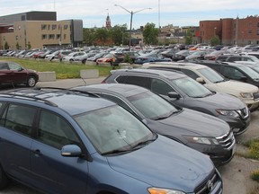 Parking lot at the Cooper Site on Friday, June 22, shows the high occupancy levels of the site, one of the reasons why the city will be adding 50 additional spaces this summer. JONATHAN JUHA/THE BEACON HERALD/POSTMEDIA NEWS