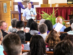Rev. Clark Veltkamp announced on Sunday, June 24, 2018, during what was supposed to the final service at North Buxton Community Church, that the community will fight to keep the church from being turned over the the British Methodist Episcopal Church, thanks to an outpouring of support. This has included Chatham lawyer Steve Pickard stepping forward to take on the case for free. Ellwood Shreve/Chatham Daily News/Postmedia Network