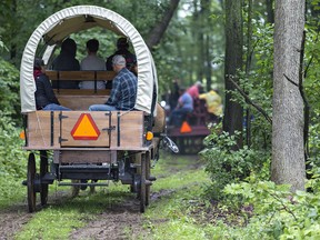 A variety of horse-drawn carriages, along with a number of outriders, went on a lengthy tour of trails at Second Chance Ranch, near Oakland, on Saturday as a fundraiser for the North American Belgian Championship. (Brian Thompson/The Expositor)