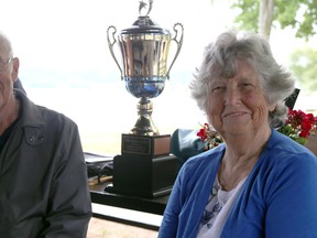 Al and Joan Taylor pose with the newly minted "Taylor Award" trophy at the farewell celebration for the Owen Sound Satellites Gymnastics Club at Kelso Beach Park on Saturday. The club will officialy close on June 30. The Taylor's started the not-for-profit club in 1977 with the "Original 7" gymnasts and the help of other volunteer parents. Greg Cowan/The Sun Times.