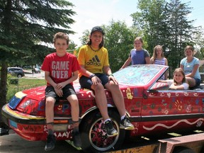 Clinton Public School students pose proudly with their completed painting project. From left to right: Neely Wiggins, Jace Barnesky, Brooklyn Phillips, Emmalyia Karpyshyn, Jordyn Clark, Kaylee Hewitt and Chase Carter. (Sheila Pritchard/Clinton News Record)