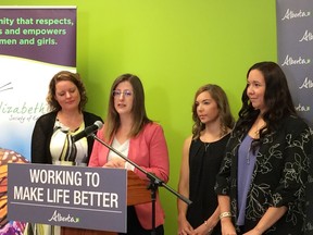 Stephanie McLean (second from left), former minister of Status of Women in Alberta, announces a new pilot program to be offered in Sherwood Park that will result in sexual violence survivors receiving free legal advise. Survivor Elzabeth Halprin (second from right) said she wishes the service had been available six years ago, when she was attacked.

Photo Supplied