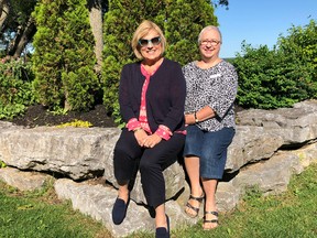 BRUCE BELL/THE INTELLIGENCER
Martha Griffin (left) and Irene Hiebert of the Canadian Federation of University Women sit in one of the gardens on County Road 3 (Rednersville Road) featured in the 19th Annual Town & Country Garden Tour on July 7. The tour features three gardens in the County and five are in Belleville’s old east hill.