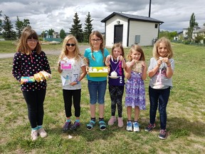 Photo courtesy of Helga Lempriere. Photographed from left to right are Rachel Lempriere, Kate Hagens, Cailyn Lempriere, Joy Rosso-Parama, Jana Meyers and Chelsey Lempriere, who represent six of 12 children in the Young Artisans Market.