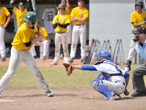 Gordon Anderson/Daily Herald-Tribune
Northern Lights catcher Ryker Van Buskirk tracks the flight of the pitch thrown by Lights reliever Nathan Antonio. The Lights dropped a 7-6 decision to the Sherwood Park A’s in Midget AAA Norwest League baseball action at Evergreen Park on Sunday afternoon.