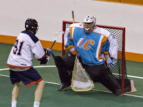 Six Nations Chiefs goalkeeper Angus Goodleaf keeps his eye on a shot by Reid Reinholdt of the Oakville Rock during a match on June 12 at  Iroquois Lacrosse Arena. (Brian Thompson/Expositor file photo)