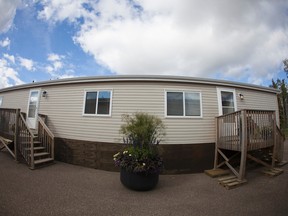 The view from the front of a four-bedroom model temporary housing unit at the Youth Assessment Centre in Fort McMurray Alta. on Friday September 9, 2016. The homes were originally offered to displaced residents following the May 2016 wildfire, but when lack of interest cancelled the program, some of the homes were sent to Fort Chipewyan. Robert Murray/Fort McMurray Today/Postmedia Network