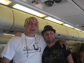 Former NHL player Dave 'Tiger' Williams, left, during an earlier 2010 military morale tour to Afghanistan with what appear to be beads stuck up his nose. thecarpetfrogs.com