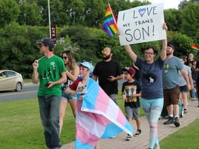 Ten-year-old Lake L'Hirondelle (third from left), who identifies as transgender, walks in the Kenora Pride parade on Saturday, June 23, accompanied by his mom Jennifer Krag (holding sign). Members of the city's LGBTQ2S+ community spoke about the growing feeling of support and celebration at the annual Pride events.
KATHLEEN CHARLEBOIS/DAILY MINER AND NEWS