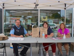 From left, Special Const. John Schultz of the North Bay Police, Fran Laframboise and Pat Cliche invited North Bay residents to drop off their unneeded drugs Tuesday for disposal. Christian Paas-Lang / The Nugget