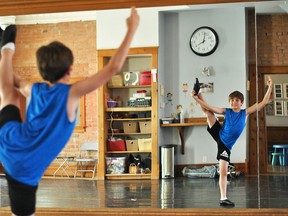 Jamieson MacNeil, 9, poses in the mirror at All That Jazz in Chatham on June 20. He has qualified in four styles of dance for Team Canada in competitions scheduled later this year. Tom Morrison/Chatham This Week