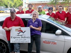 Mike Makarich, front left, and Britinay Wheeler, front right, have built their business, B&M Express Delivery, that began by serving customers on their Chatham Daily News routes. They are pictured with their crew of delivery drivers, from back, left, Hayden Klingbile, Tyler Hill, Kieran Davidson, Tirzah Van Kesteren, Jeff Hrycyk and Kevin Henderson, in Chatham, Ont. on Monday June 25, 2018. Ellwood Shreve/Chatham Daily News/Postmedia Network