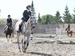 Riders compete in the on the flats portion of the Northern Equestrian Circuit show at Trevella Stables in Sudbury, Ont. on Saturday June 9, 2018. Over 50 riders took part in the event, the next NEC show goes at Foothills Farm on August 10 - 11, 2018. Gino Donato/Sudbury Star/Postmedia Network