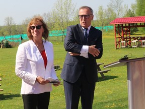 BRUCE BELL/THE INTELLIGENCER
Prince Edward County Coun. Dianne O’Brien has announced she will run for mayor in the October municipal election. She is pictured here as acting mayor with MP Neil Ellis during a May announcement at Three Dog Winery.