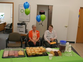 Shirley Wyness Torres (left) is retiring from Servus Credit Union after many years of service. Bernice (right) beat her to retirement after 24 years of working together. Servus Credit Union put out cookies, sandwiches and iced tea for anyone who came to help Shirley celebrate the next step in her life - which starts June 30.