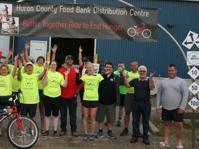 Prior to the Better Together Ride to End Hunger on June 16, the group gathered by the archway at the Huron County Foodbank Distribution Centre in Centralia. (William Proulx/Exeter Lakeshore Times-Advance)