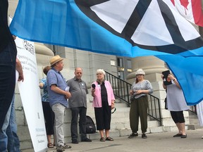Members of PeaceQuest gather to announce their plans to commemorate the 100th anniversary of the armistice that ended the First World War later this year in Kingston. (Elliot Ferguson/The Whig-Standard)