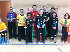 National medal winning students from the Golden Tiger School of Kung Fu. From left to right: Taylor Sinclair, Jason Wilkie, Hope Kroeplin, Julien Kapalanga, Danny Richardson, Ewan Calhoun, Sifu Trevor Uitvlugt, Griffin Prior, Kieran Wright, Sasha McMurray