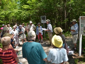 Bob Knapp, chair of the Friends of Hibou, addresses those who gathered for the opening of the Hibou Wetland Interpretive Trail on Thursday. (Rob Gowan The Sun Times)