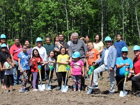Community members of the Chippewas of Nawash Unceceded First Nation at Neyaashiinigmiing joined representatives of Habitat for Humanity Grey Bruce and the federal government this afternoon at a ground-breaking ceremony for a joint pilot project at Neyaashiinigmiing, where four homes will be built this year. Photo by Zoe Kessler/Wiarton Echo