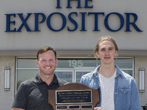 Alex Bakker of Brantford Collegiate Institute is presented the Ed O'Leary Memorial Award for the Brant County male student athlete by Expositor sports editor Brian Smiley. (Brian Smiley/The Expositor)