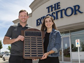 Kaitlyn Overeem of St. John's College is presented the Ed O'Leary Memorial Award for the Brant County female student athlete by Expositor sports editor Brian Smiley. (Brian Smiley/The Expositor)
