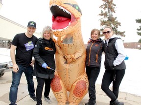 Dave Doyle, left, Shelly Sorensen, Geoffrey Metituk, Shirley McDonald and Carrie Robinson pose for a photo at the Alberta Summer Games 100 days out barbecue at the Leisure Centre in April.