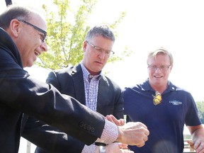 Jean-Marc Spencer and Paul Mayer of Desjardins release butterflies as board member Scott McCulloch looks on at the launch of the 2018 Desjardins Live Butterfly Release for Maison McCulloch Hospice in Sudbury, Ont. on Thursday June 28, 2018.The butterfly release takes place on Sunday August 19, butterflies can be purchased for $30 each. Gino Donato/Sudbury Star/Postmedia Network