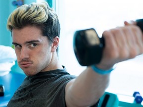 Humboldt Broncos bus crash survivor Ryan Straschnitzki does muscle-strengthening exercises during a physiotherapy session at the Shriners Hospital in Philadelphia on Monday. Paul Chiasson/The Canadian Press