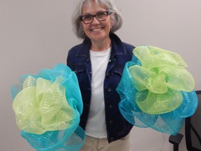 Anne-Marie Thibodeau has been working with a committee of nine people making International Plowing Match bows for horticultural societies for sale to the public. Handout/Chatham This Week