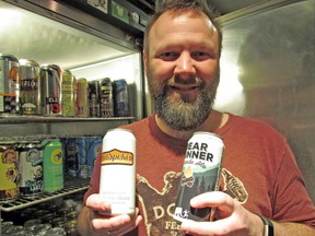 Loplops owner and Festival of Beer organizer Steve Alexander displays two of the many brews that were featured at this year’s festival: OutSpoken and New Ontario Brewing Co., product Bear Runner.