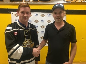 New Flyer Griffin MacDonald with Head Coach Chris Corbett. (Contributed photo)