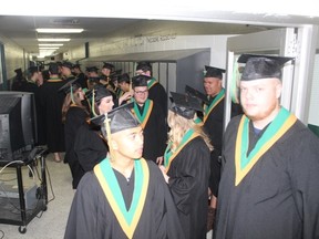 Grads waited in the hallways of MUCC before the start of MUCC's 50th graduation ceremony on Thursday, June 28 at MUCC.