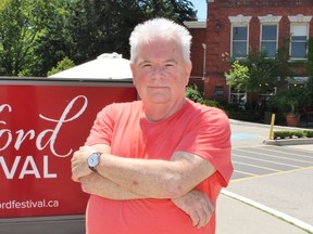 Bob White stands next to the Stratford Festival sign on Friday, June 29, 2018 in Stratford, Ont. (Terry Bridge/Stratford Beacon Herald)