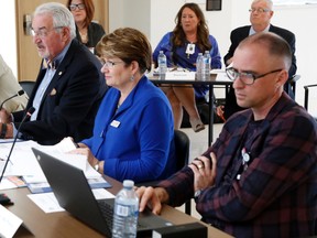 Luke Hendry/The Intelligencer
Quinte Health Care chairman Stuart Wright, second from left, speaks at a board meeting Tuesday in Belleville. Joining him at the table are vice-chairman David MacKinnon, left, president and CEO Mary Clare Egberts and interim chief of staff Dr. Colin MacPherson.