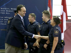 Kingston and the Islands M.P. Mark Gerretsen congratulates CSC recruits after an announcement from CSC on Friday that the new National Training Academy for correctional officers will be built on the grounds of the Collins Bay Institution in Kingston. (Ian MacAlpine/The Whig-Standard)