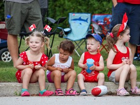 Some of Innerkip's youngest Canadians take in the Lions Club's Canada Day parade on Saturday. (Chris Funston/Sentinel-Review)