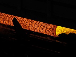 A steel billet is pierced during the hot rolling process to create a seamless pipe at the Tenaris pipe mill Wednesday, June 6, 2018, in Bay City, Texas. Tenaris, which imports steel from it's facilities around the world, is seeking an exemption from the steel tariff. (AP Photo/David J. Phillip)