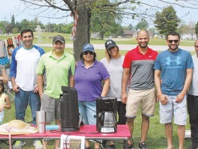 From left to right, Jessie, Bhavna Sikka with daughter Gia, two who wanted to remain anonymous, Neeta Marwah, social chair of the Sault Ste. Marie Cricket Club, Ayesha, Ariel, Maulik and Rupam pose after the club’s recent garage sale to raise funds to upgrade local cricket facilities.
Allana Plaunt/Special to Sault This Week