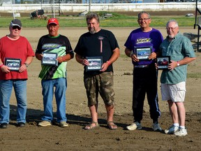 Walter McIlroy, left, Tom Hazlett, Garry Lemesurier, Brett Reaume, Jim Jones and Mike Bennett are honoured during the fifth annual Alumni Hall of Fame induction ceremony at South Buxton Raceway in South Buxton, Ont., on Saturday, June 30, 2018. Absent is inductee John McIlroy. (Contributed Photo)