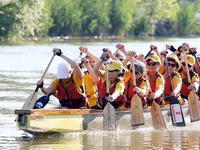 The Breast Buddies dragon boat team practises on the Sydenham River in Wallaceburg, Ont., on Thursday, June 28, 2018. (MARK MALONE/Chatham Daily News/Postmedia Network)