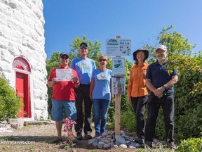 The ButterFy Gardens of Saugeen Shores (BGOSS) officially welcomed Chantry Island as an official site June 21 at a ceremony attended by Captain Howard McLaren (left), pod squad ambassadors Steven and Diane Baulch, BGOSS executive Melitta Smole and Chantry Island gardening crew member Mark Clark. Submitted photo