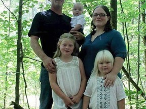 Police have now identified the victims of the early Monday morning house fire in this family photo taken last fall as John Kramer Jr., and daughters Shailyn, 9, and Britnee, 5. Dillon, 15 months, survived, as did his mother, Lindsy Mitchell, who was in a London hospital Wednesday, June 13, 2018. (Monica Graham Photography)