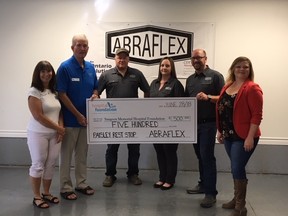 Saugeen Memorial Hospital Foundation representatives Sally Kidson (left) and Jim Barbour accepted a $500 sponsorship cheque from Abraflex's Mark Gillespie, Lynsey Trelford,  Kevin Courtney and owner/treasurer Desiree Norwegian at the Paisley facility June 28. Abraflex will host a cyclists' rest stop at Paisley Arena. Submitted photo