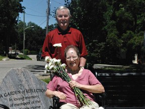 Brantford Coun. Larry Kings, chair of the John Noble Home board of management, and Margaret MacAskill, resident council president, attend the opening of a memorial garden at the municipally operated home for the aged on Tuesday. (Vincent Ball/The Expositor)