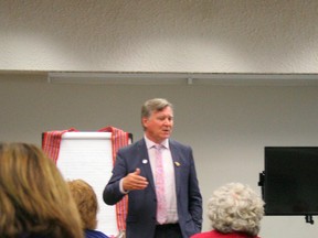 John Feehan, Minister of Indigenous Relations, speaks to a group of Metis leaders and other political leaders including Marg McCuaig-Boyd, MLA Dunvegan-Central Peace-Notley and Debbie Jabbour, MLA Peace River.