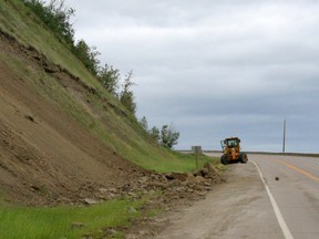 Motorists travelling the Highway 2 on the Dunvegan Hill early in the morning of June 26 had an unpleasant surprise as part of the hill came down, boulders landing in the road. Some were unlucky enough to have to dodge large rocks and they rolled or bounced across the highway on the north slope of Dunvegan. By the afternoon, contractors had cleared the lane, but there are still signs cautioning drivers to slow to 50 km/h in case more rocks come down.