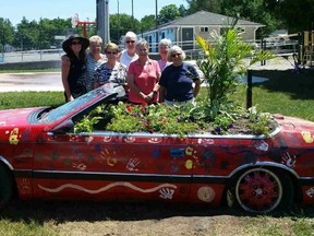 The group pose proudly with the completed garden car. Back row: Central Huron Community Improvement Co-ordinator Angela Smith, Jane Groves, Amy Gerrits, Katherine Horton. Front row: Ruth Ann Soder, Sibyl Tebbutt, Joan Addison. (CONTRIBUTED PHOTO)